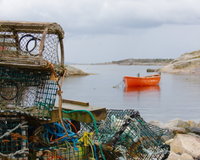 Lobster traps and boat at Peggy's Cove, Nova Scotia